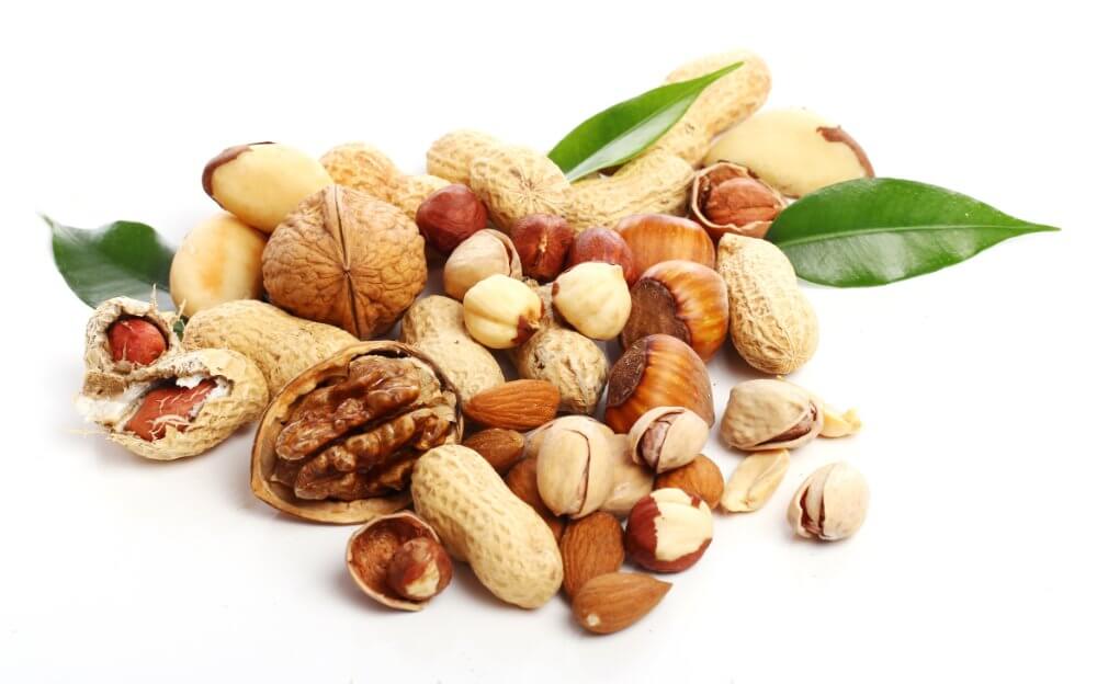 alimentos-con-mas-proteinas-nueces-nueces-cacahuetes-semillas-almendras
